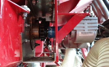 Electric Drive Gravity Drills - Fieldmate Edrive fitted - Duncan DD30 FieldMate electric Drive side mount on flexiseeder stainless steel metering unit motor coupling close up